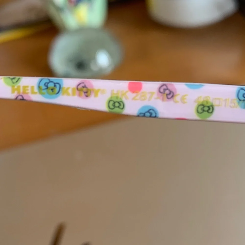 Hello Kitty Black Frame Sunglasses with Pink Patterned Temples